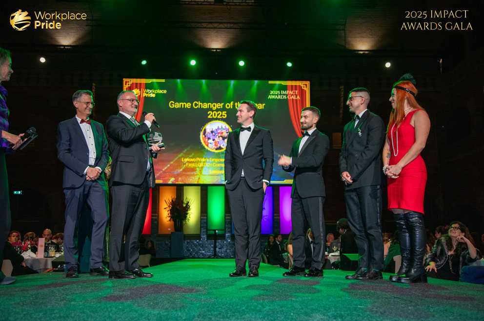 2025 Impact Awards Gala Game Changer - Winners standing on stage with award